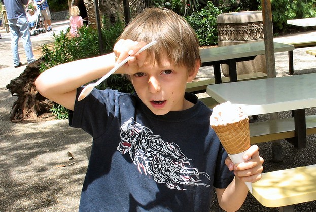 “Brain freeze” occurs when the nerves in the back of your mouth suddenly get very cold, giving you a brief (but strong) headache. A quick way to stop it is to warm the nerve endings by drinking a glass of water (no ice).